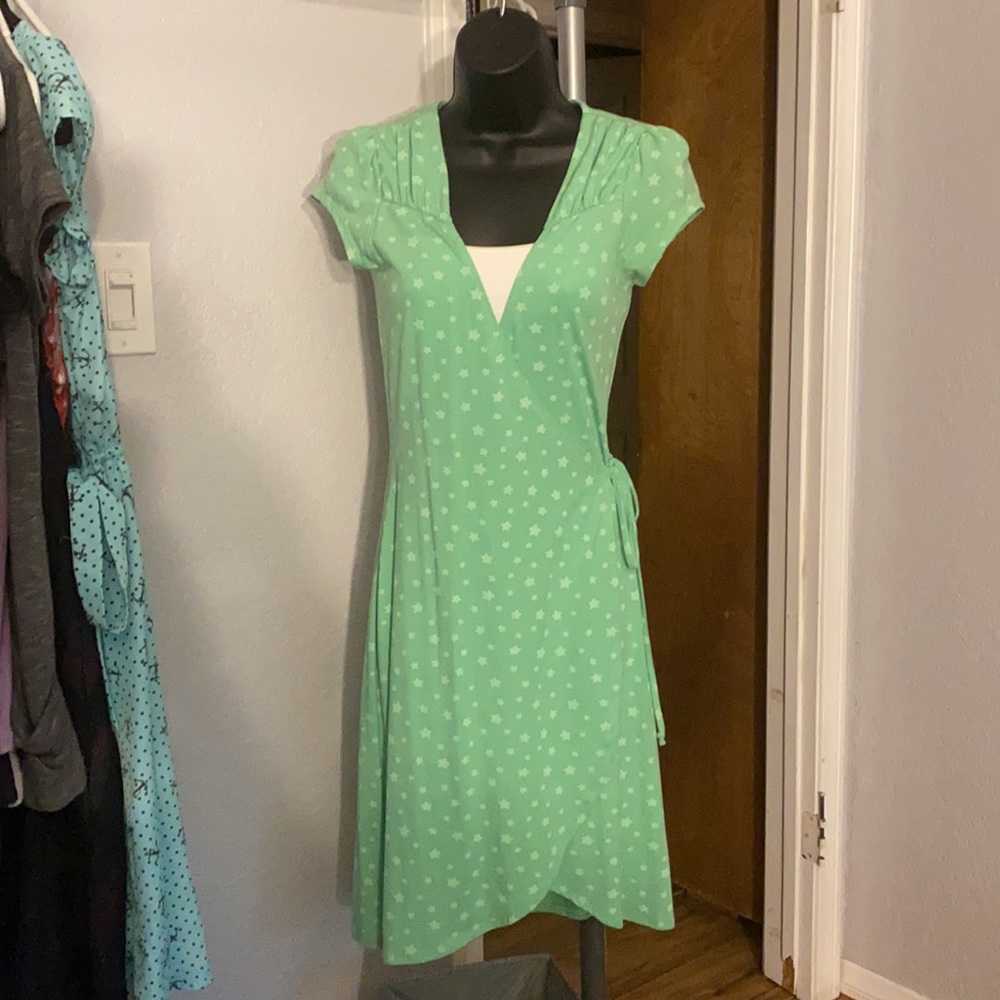 Mint green dress with stars. Size S.